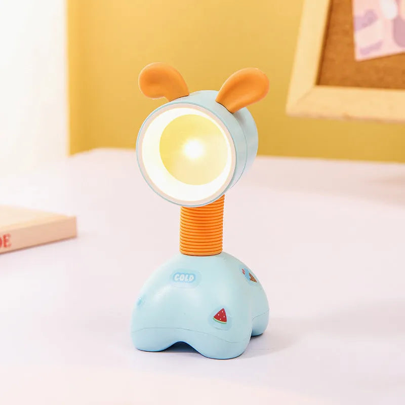 DIY cartoon magnetic small night lamp with adjustable lighting angle on desktop