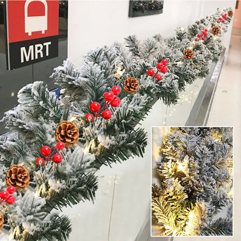Flocked artificial Christmas garland with rattan elements in snow-dusted white