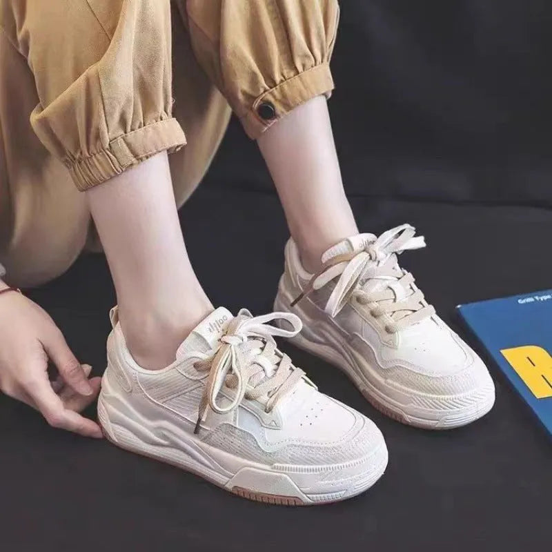 Beige low-top rubber sneakers with height increasing soles and imitation leather lining