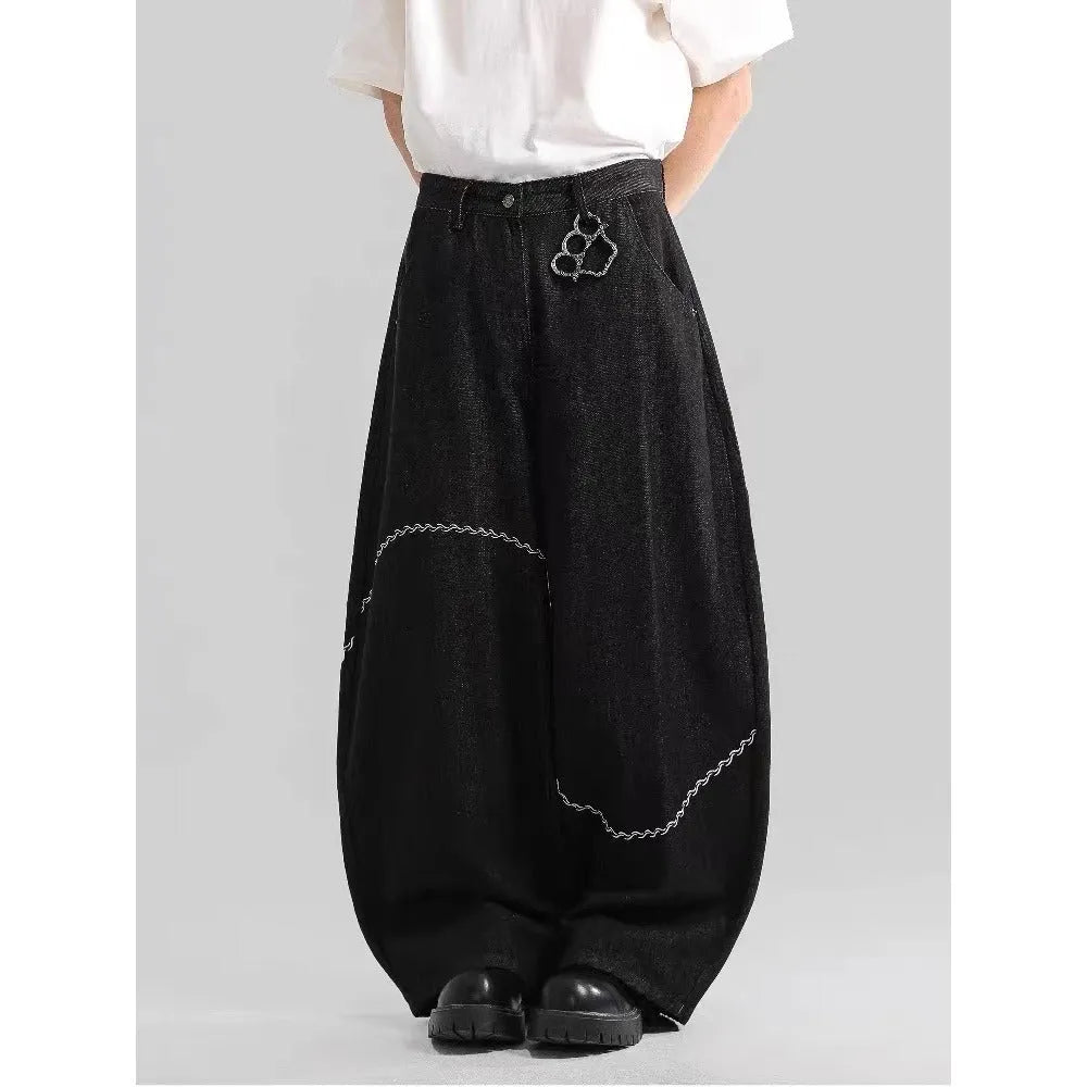Men's black straight-leg jeans with a mid-waist design and zip fly, made from micro-elastic polyester denim.