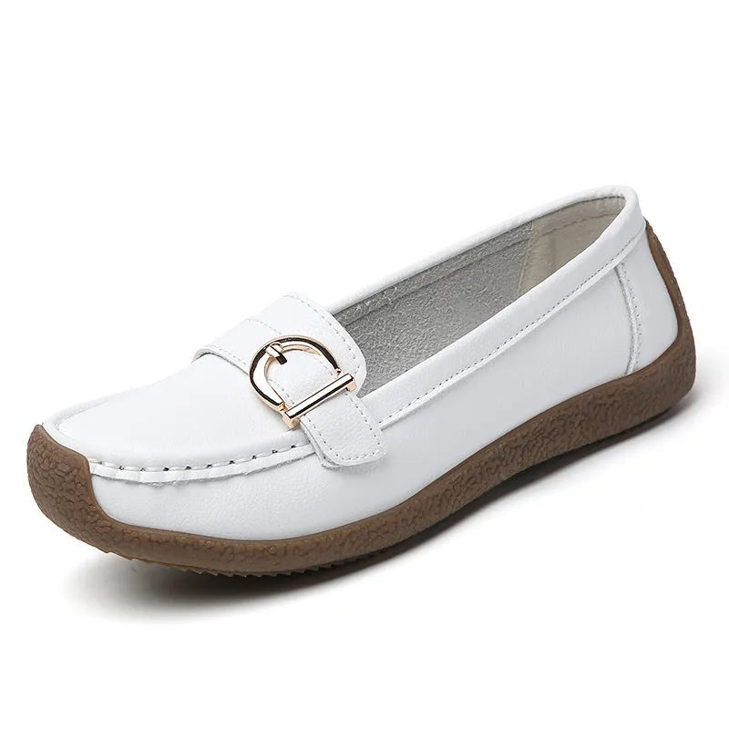 Women's beige casual flat loafers with round toe and slip-on design on a soft sole.