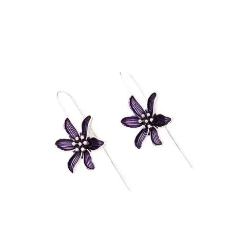 Close-up of a pair of purple flower-shaped alloy stud earrings with an electroplated finish.