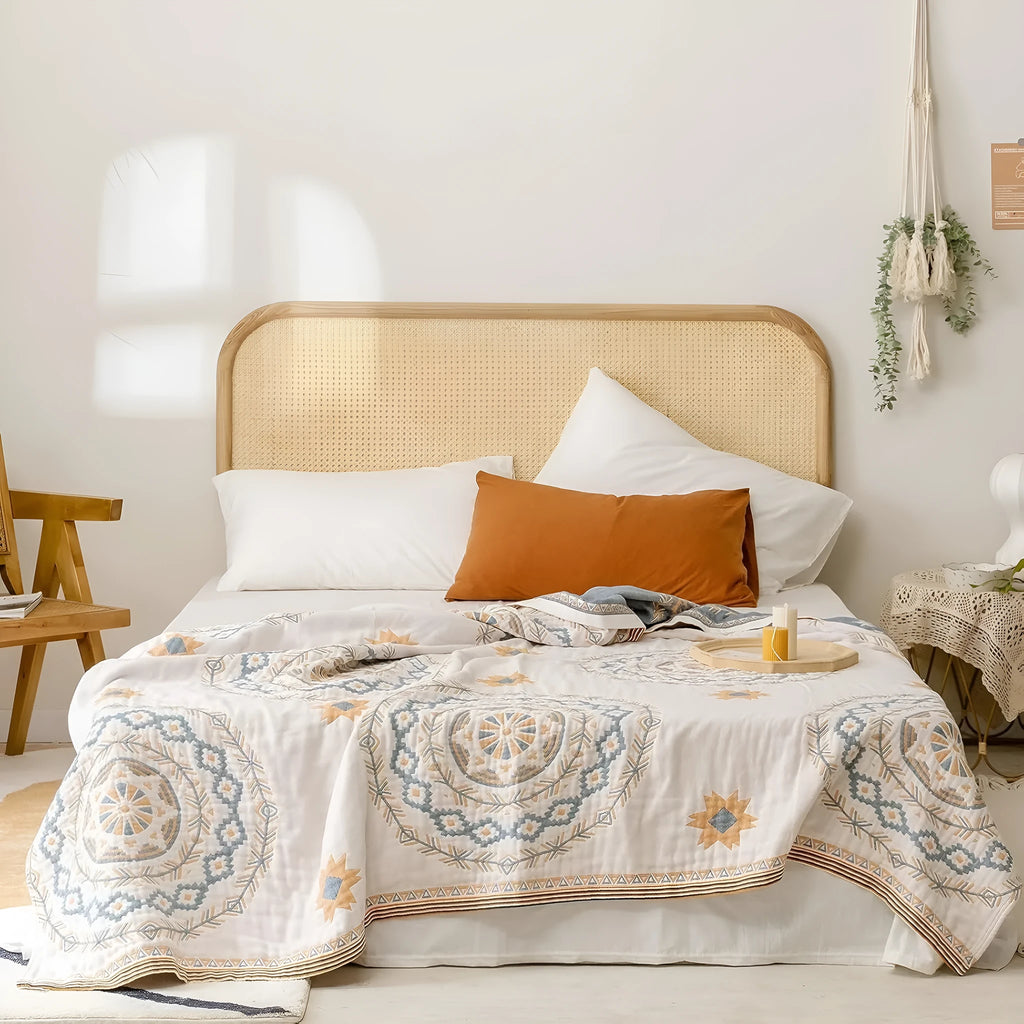 Cotton towel blanket with geometric pattern shown in two size options: 180x200cm and 200x230cm.