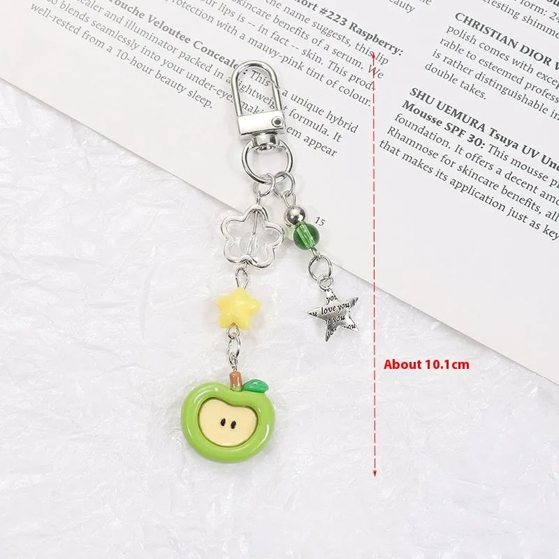 Fruit pattern mobile phone charm keychain with apple and strawberry designs on plastic resin