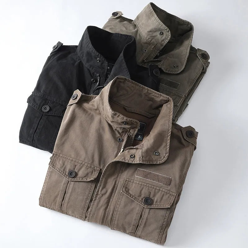 Men's loose fit cotton twill jacket in light coffee colour with zip front, shown on a hanger.