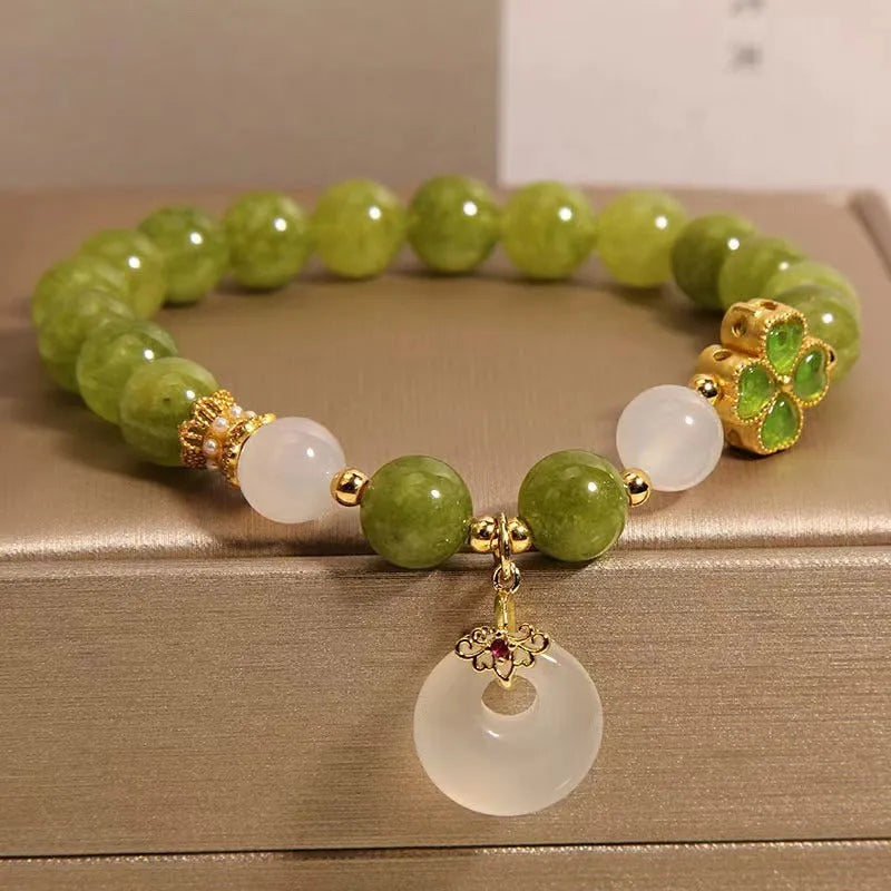 Natural green tourmaline women's bracelet with four-leaf clover design and safety buckle in New Chinese style