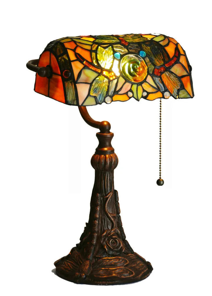 10-inch Tiffany stained glass table lamp with resin base on a desk.