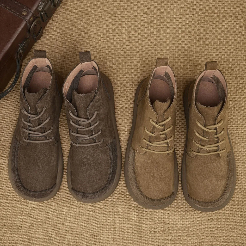 Genuine leather British-style Martin boots with wedge heel in frost-grey colour showing lace-up design and mid-calf length