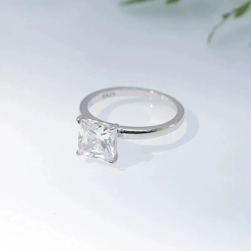 Simple geometric 925 silver women's ring with a round design, shown in silver, gold, and rose gold finishes.