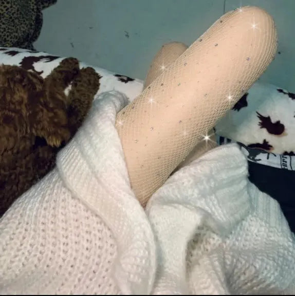 Women's mesh fishnet stockings in free size, showing thin nylon construction in skin colour option