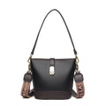 Soft black PU bucket style messenger bag with double shoulder straps, shown open to reveal internal organiser pockets.