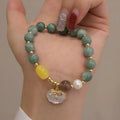 Natural green jade shell bracelet on adjustable cord for women's casual jewellery