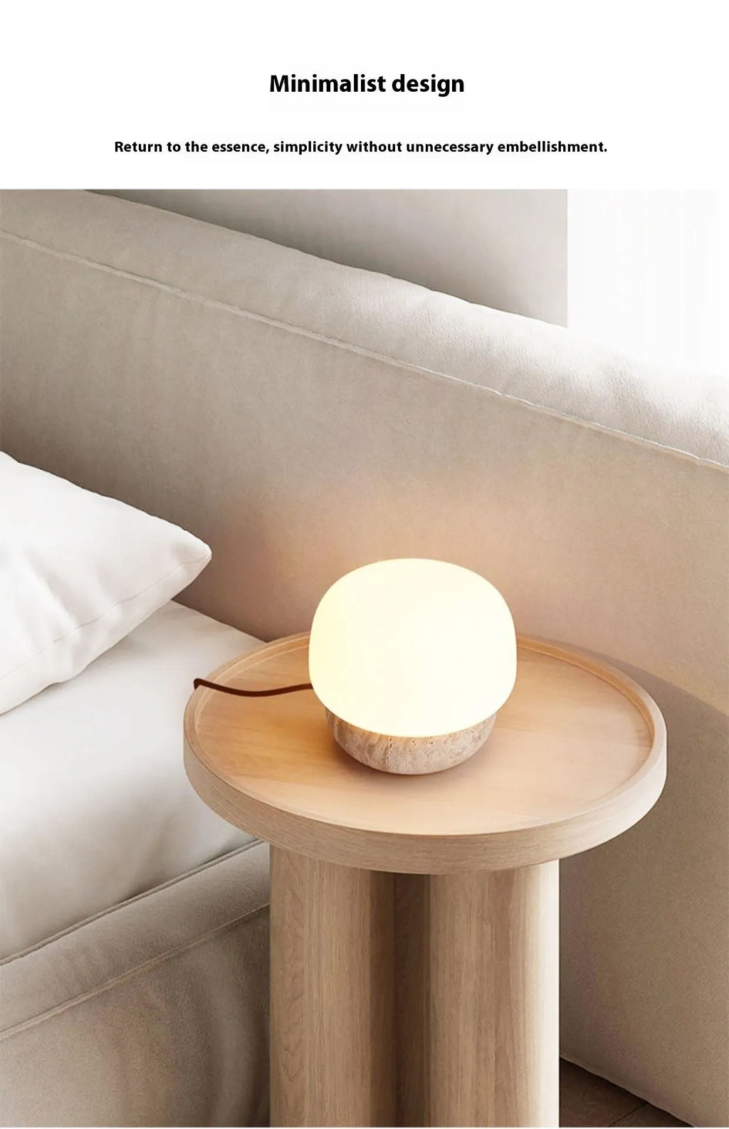 Cream coloured retro bedside lamp with button switch on small table