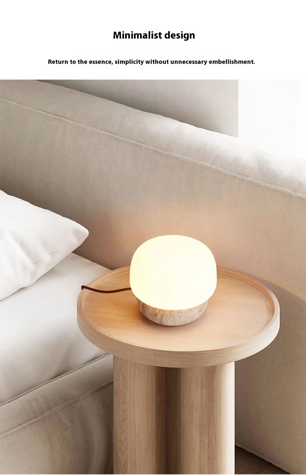 Cream coloured retro bedside lamp with button switch on small table