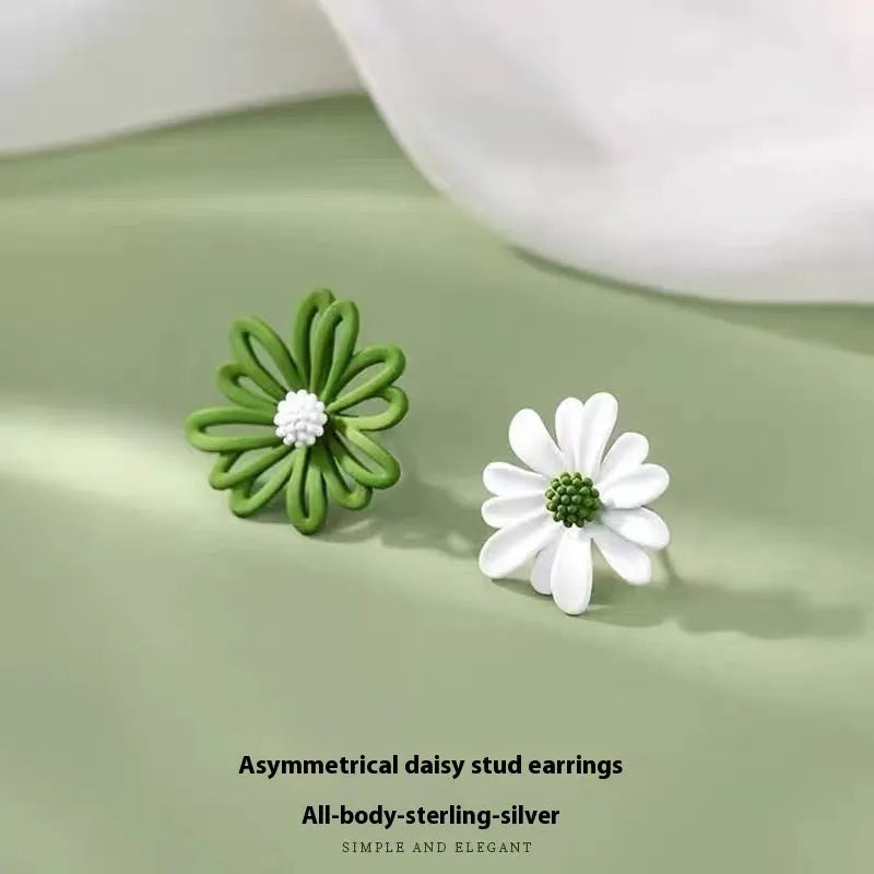 Flower-shaped alloy stud earrings in three colour combinations: blue-orange, white-green, and yellow-white