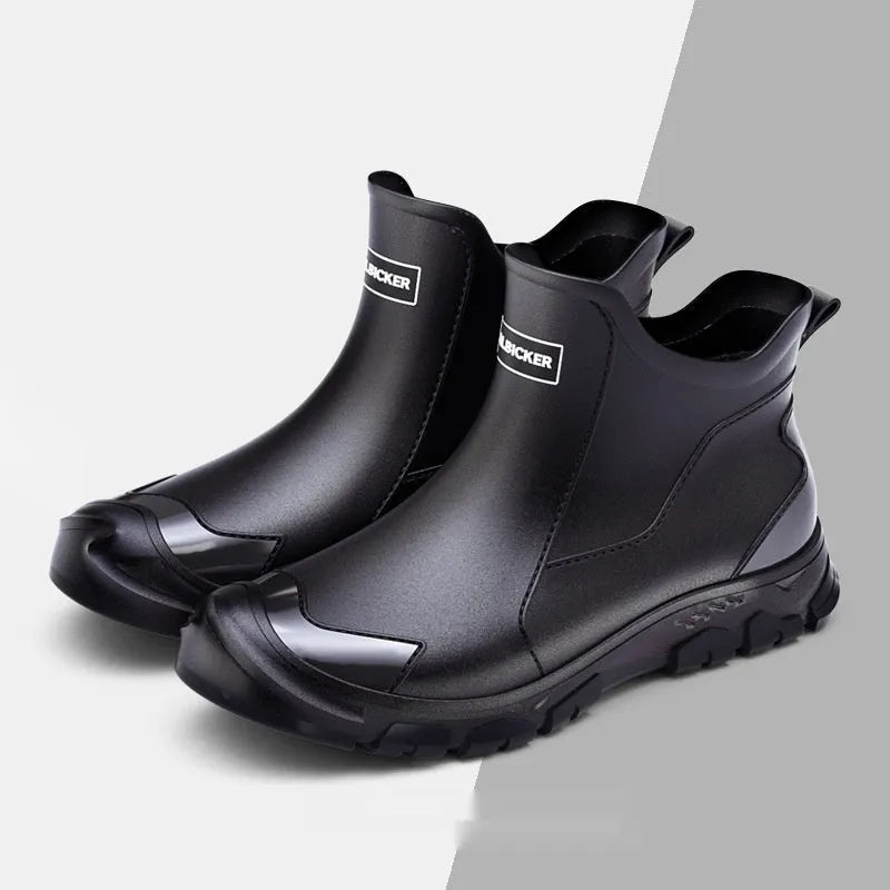 Short tube PVC wading shoes with a round toe and non-slip plastic sole on a flat heel.