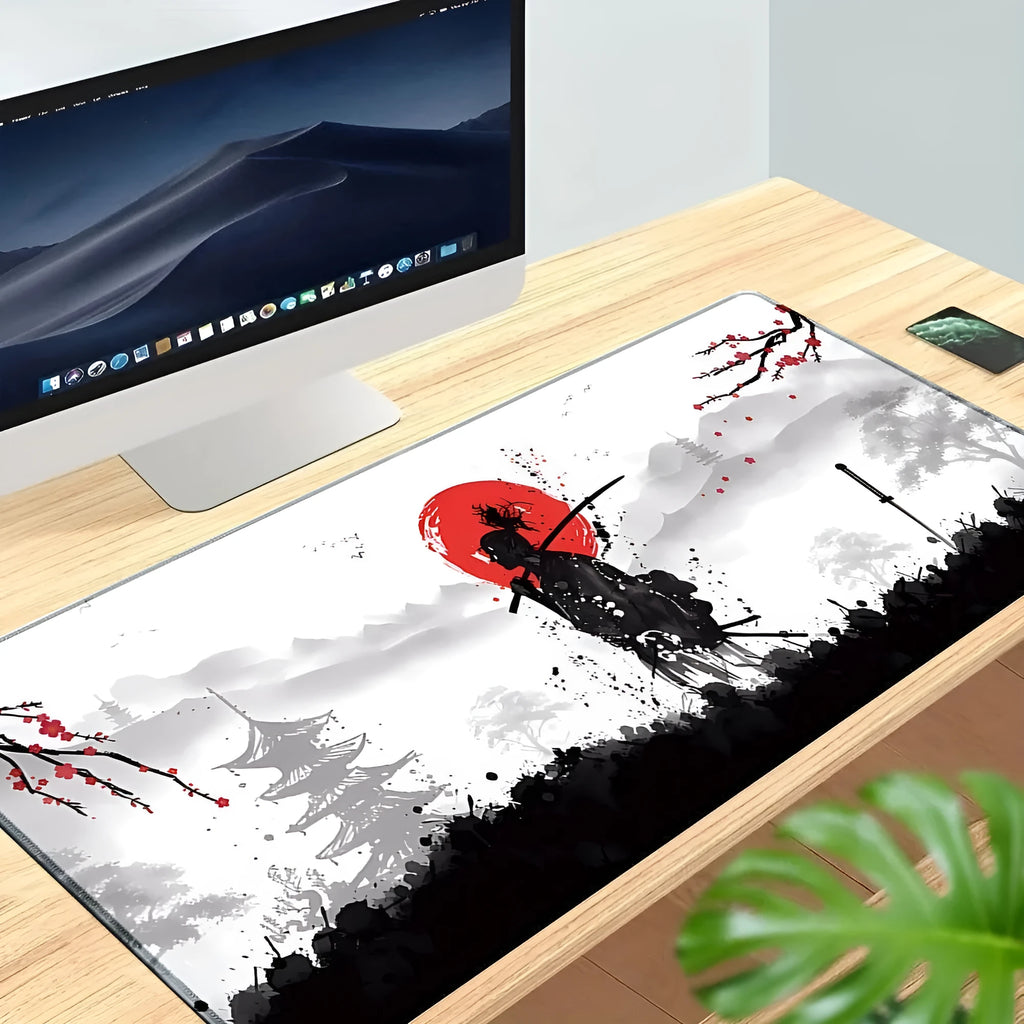 Japanese samurai artwork printed on a large black cloth gaming mouse pad on a wooden desk.