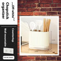 Plastic wall-mounted chopsticks basket with spoon holder in beige, dark green, or orange showing cross-border drainage design