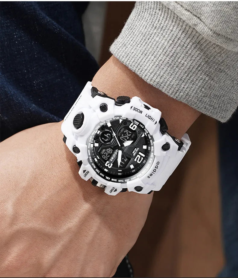 Men's black electronic sports watch showing analogue hands and a digital display on a plastic strap
