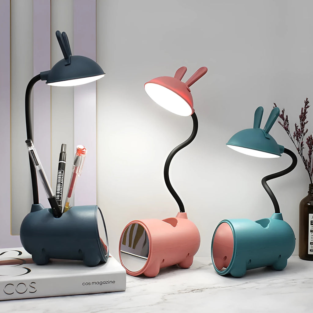 Cartoon-style USB-powered table lamp with pen container in green, blue, or pink colour