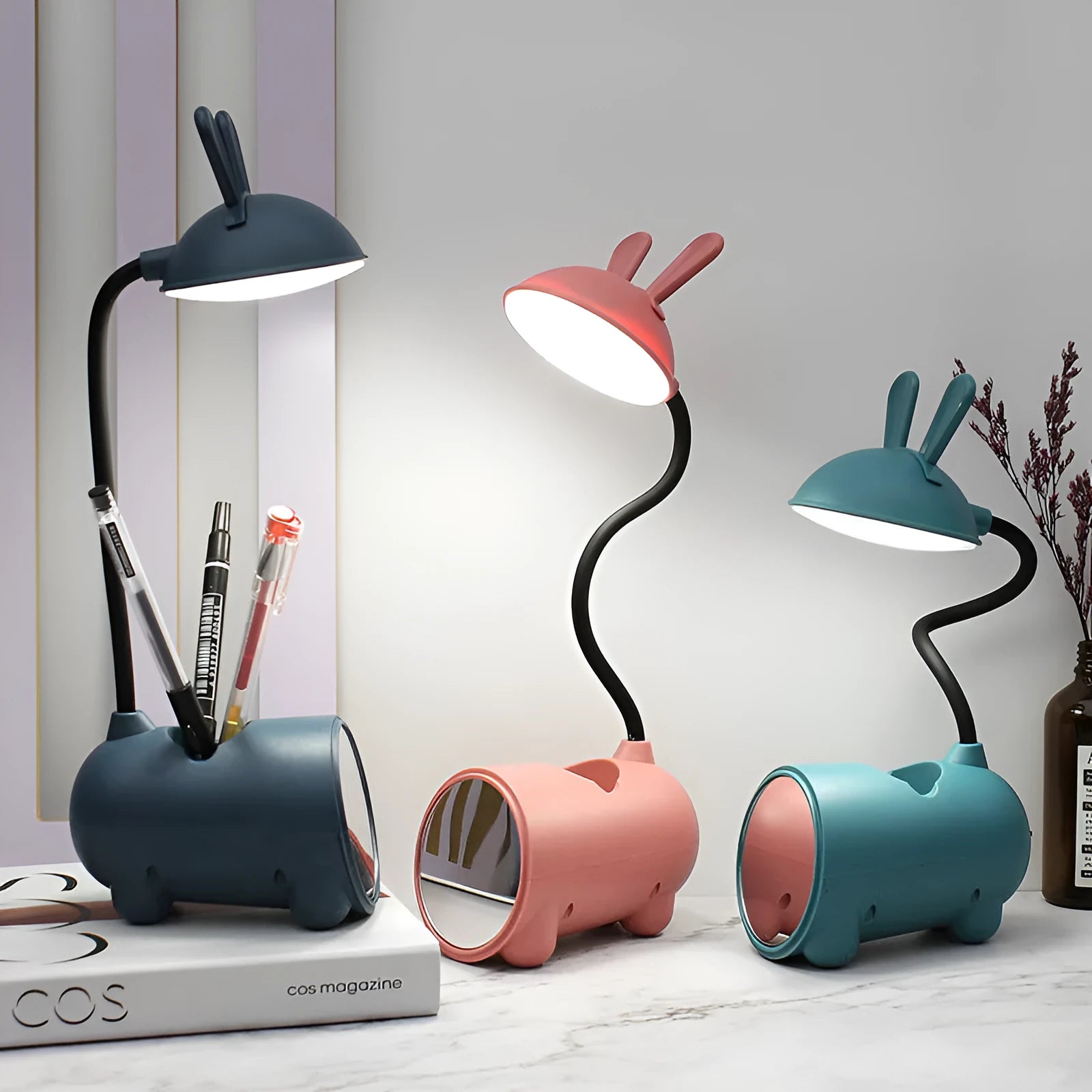 Cartoon-style USB-powered table lamp with pen container in green, blue, or pink colour