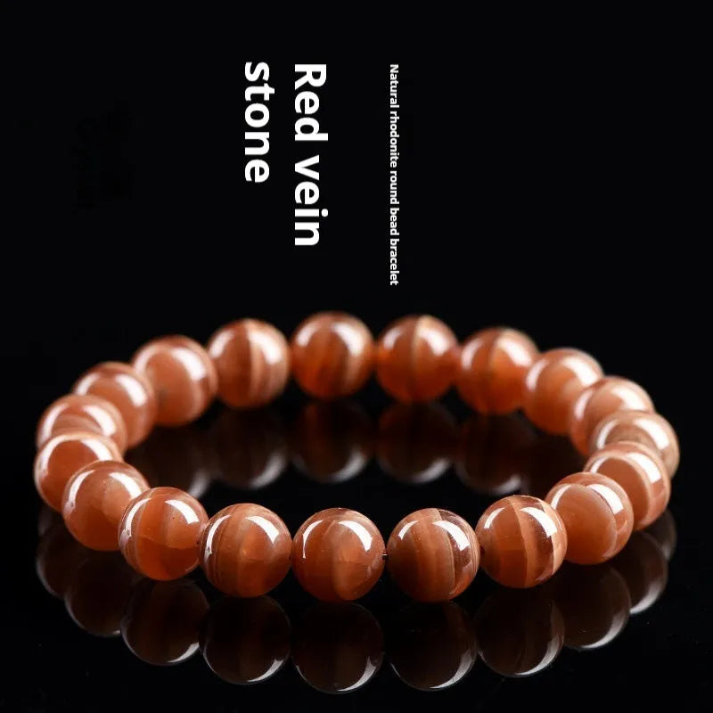 Natural Old Mine Rhodochrosite round bead bracelet with Ruyi element, choice of 6mm or 8mm beads.
