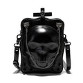 Black gothic mini square messenger bag with skull embossing, stitching, rivets, and chain details on textured PU polyester