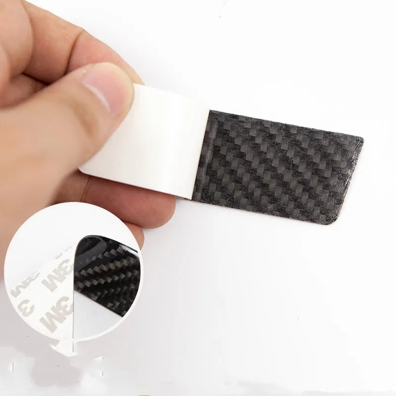 Tesla Model S carbon fibre door handle protection patches with textured drip pattern design