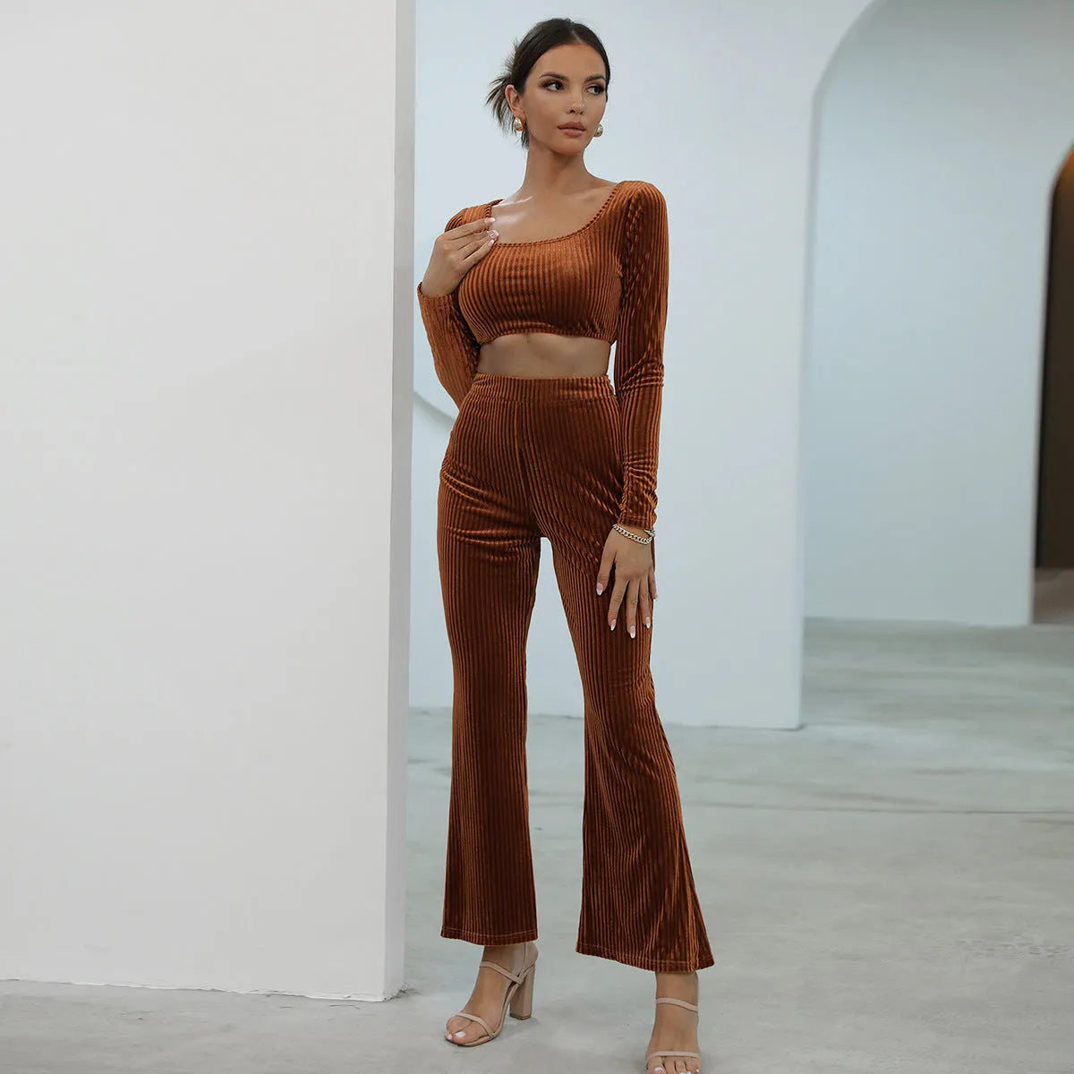 Caramel-coloured long sleeve sweater and trouser casual set on hanger