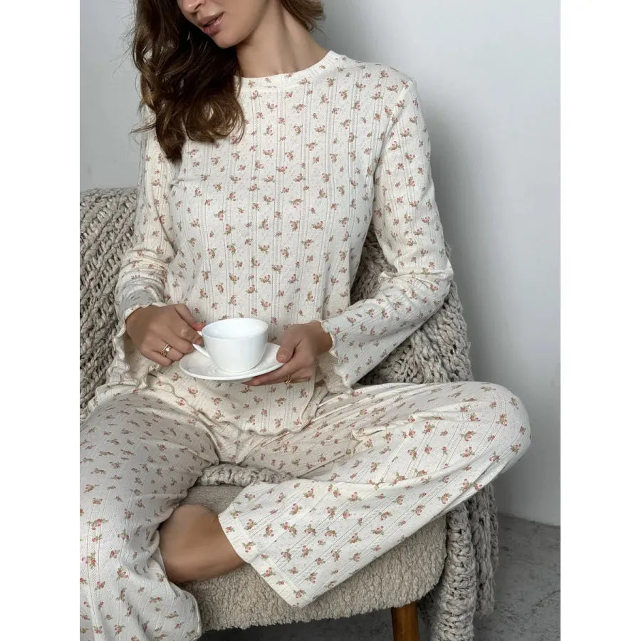 Women's white floral print bell sleeve top and matching wide leg trousers suit set