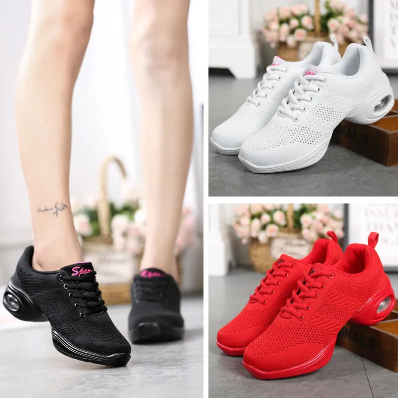 Women's breathable flyknit mesh dance shoes with a light PU sole on a wooden floor.
