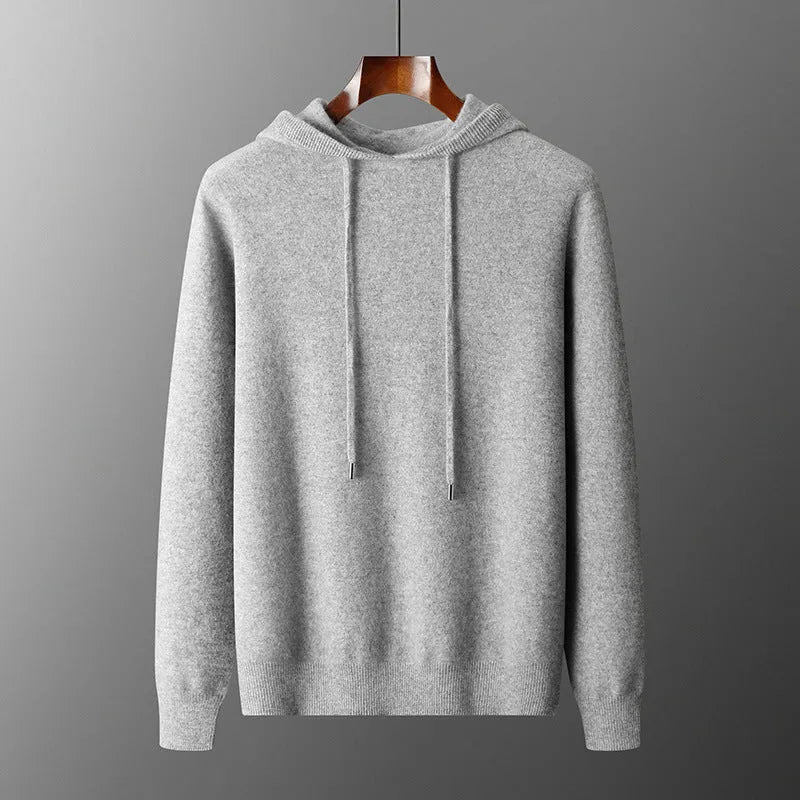 Men's light gray cashmere hoodie and matching trousers laid out as a complete casual two-piece set.