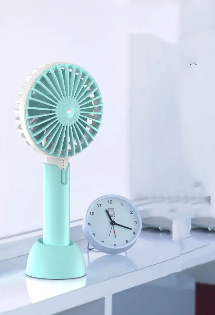 Blue USB mini desktop fan with 3 speed settings and figure 8 head motion pattern
