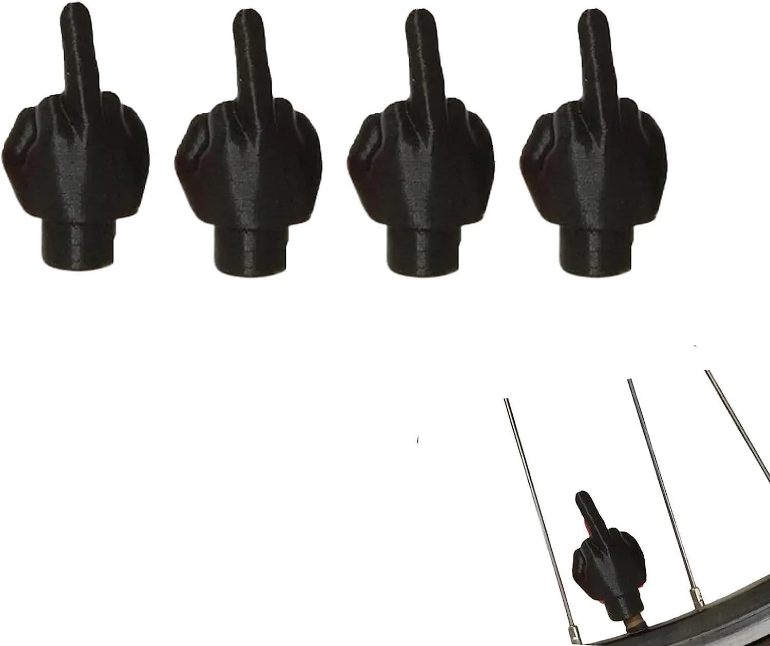 Four latex car tyre valve dust caps, shown in black and skin colour, arranged on a surface.