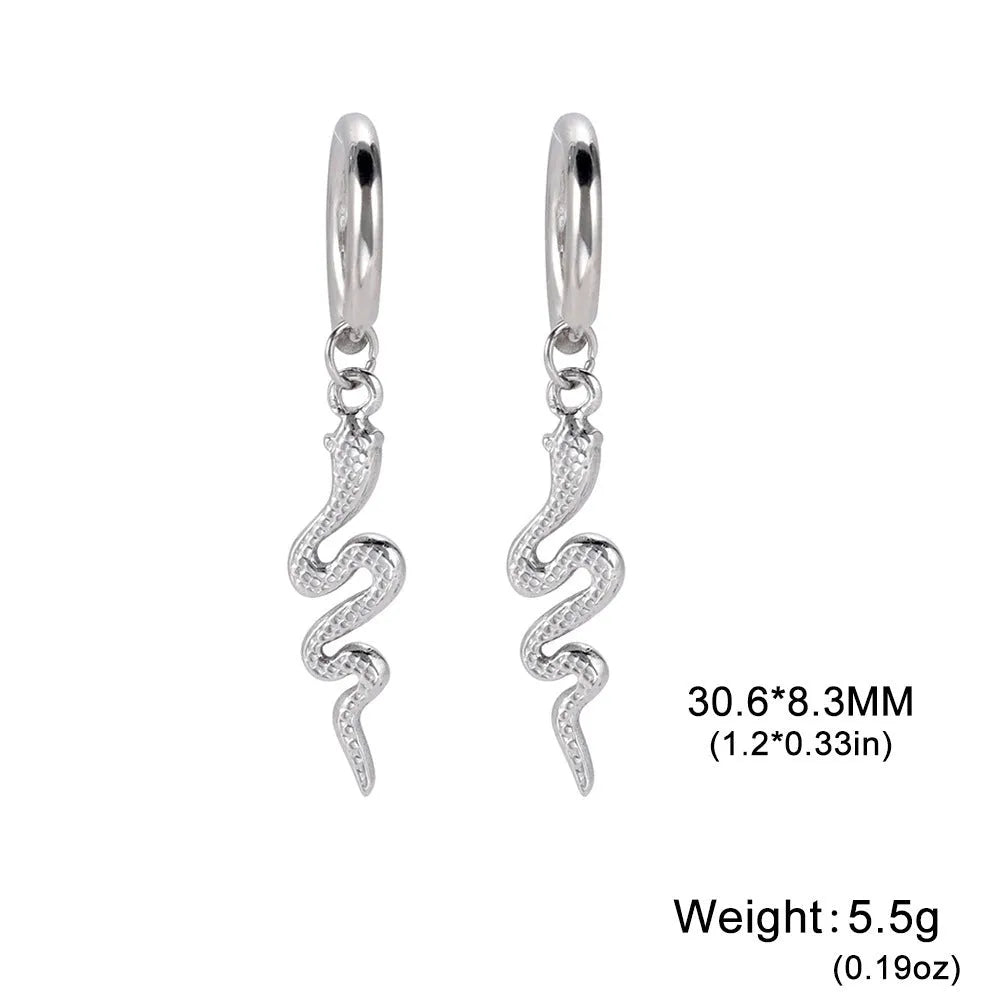 Gold snake clip-on earrings in vintage animal zodiac design