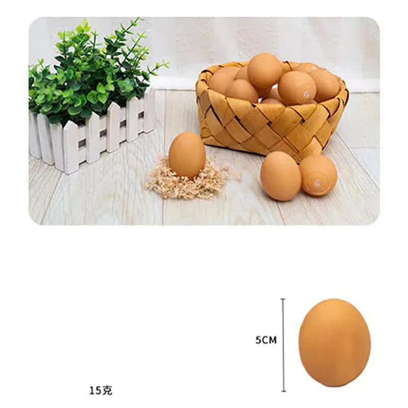 Red and white egg-shaped dog chew toy with textured surface and built-in squeaker