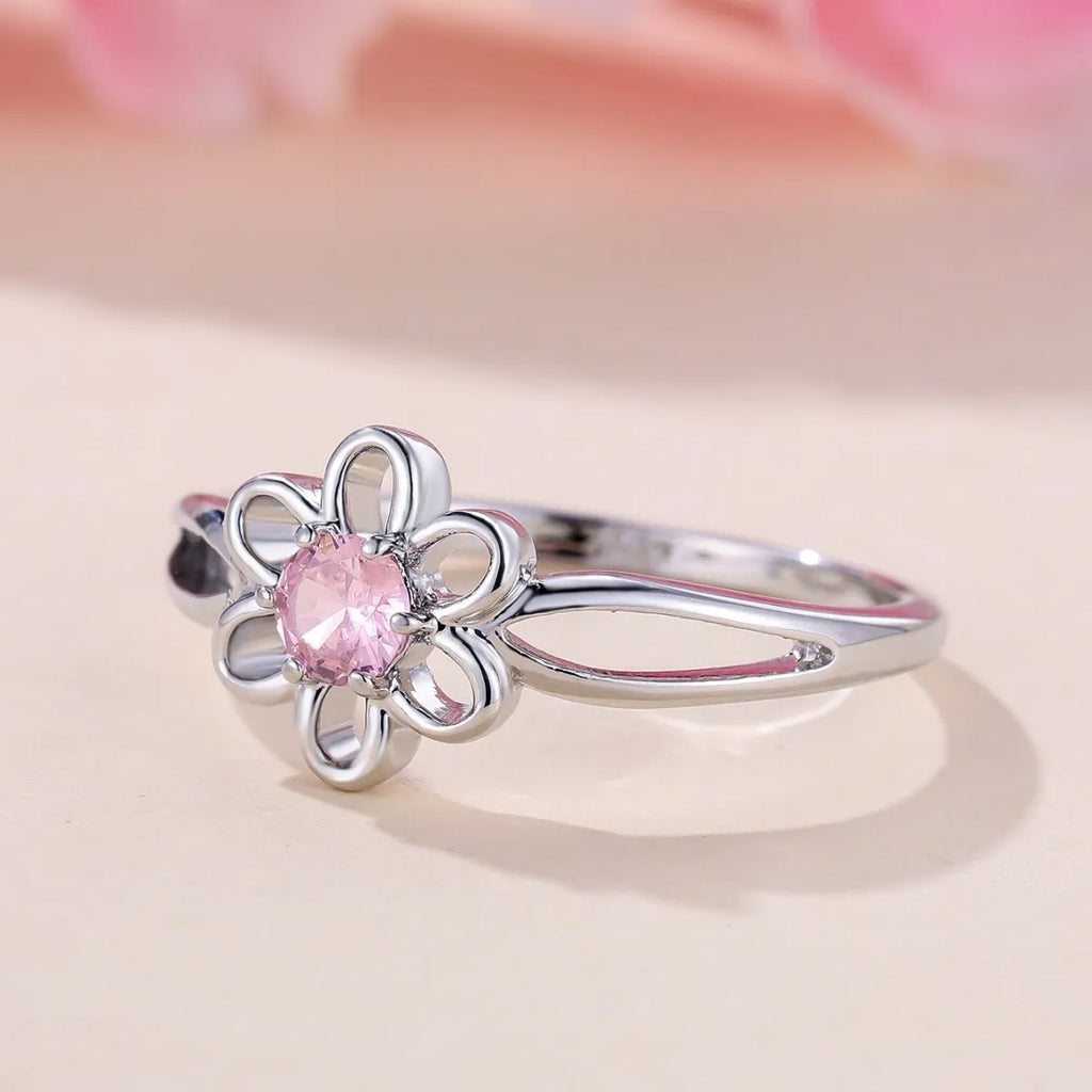 Copper fashion ring with hollowed flower design in platinum pink diamond colour