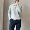 Men's loose grey modal knit sweater with rabbit fur trim detail on the chest, long sleeves.