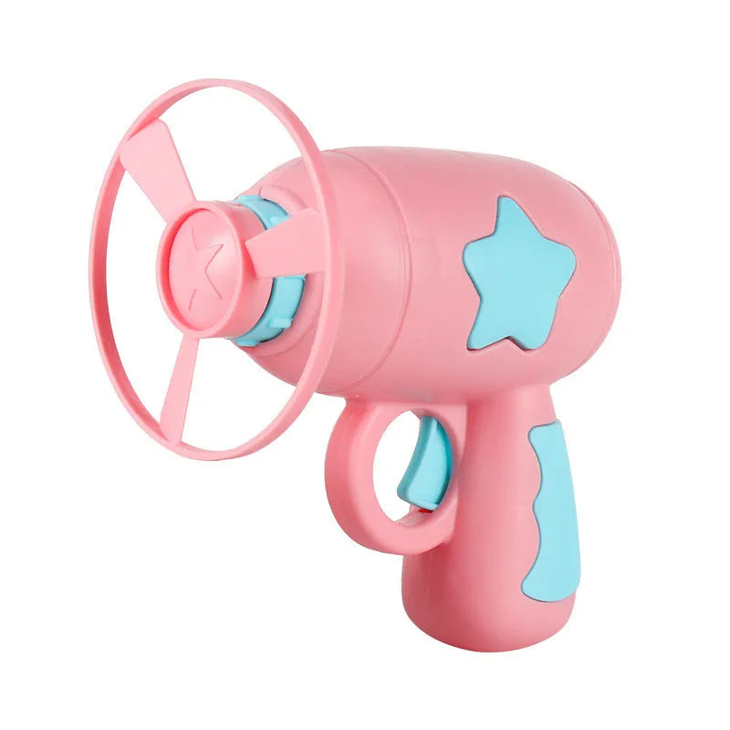 Flying saucer launcher toy set with plastic disc shooter gun, flashing discs, and target board, in blue, navy, pink, and yellow