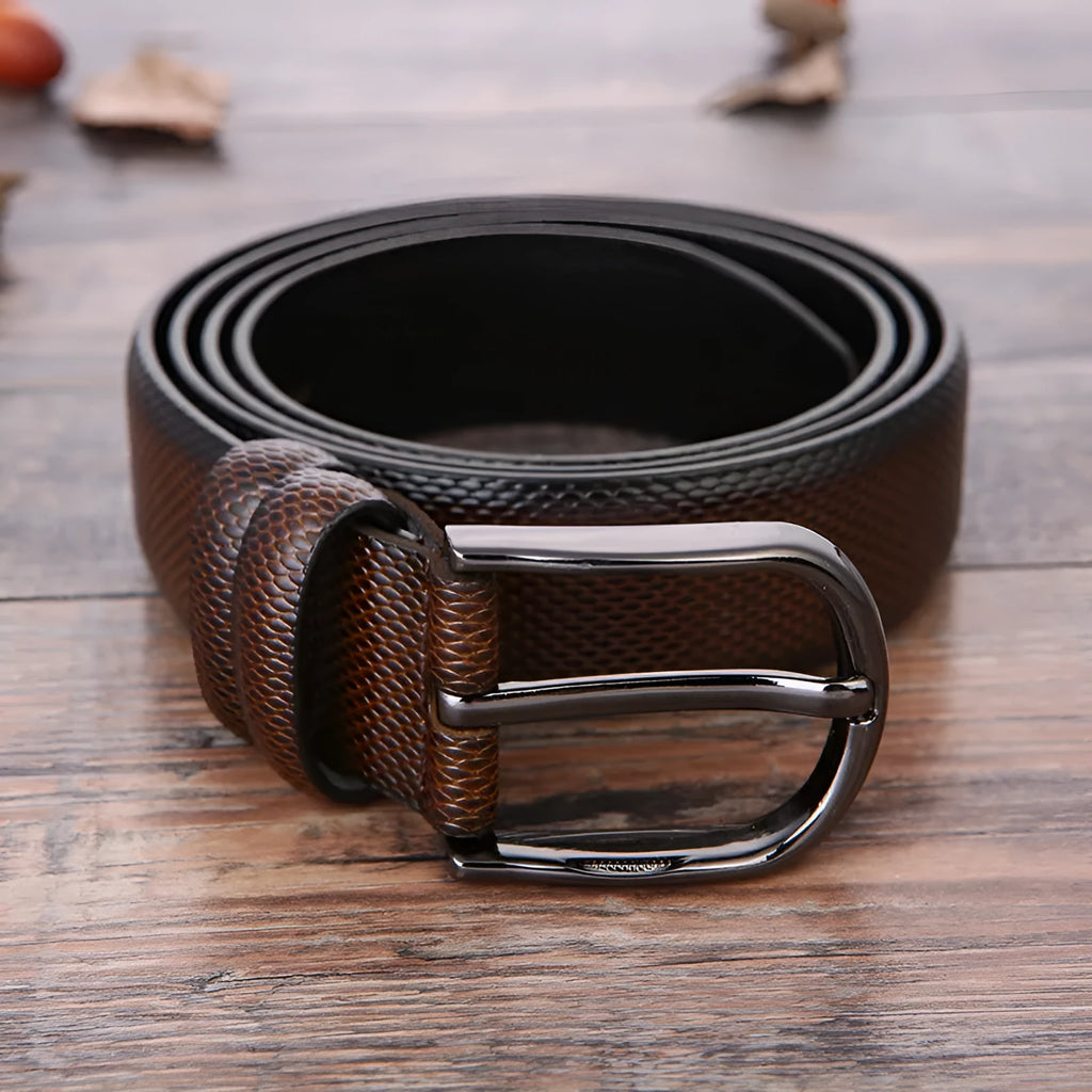 Men's business belt with electroplated alloy buckle showing laser logo pattern detail