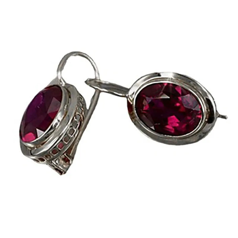 Red oval gemstone hollow earrings in electroplated alloy, geometric women's design, silver gold or rose gold finish