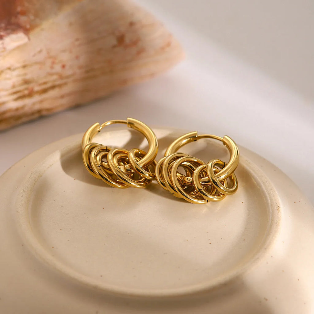 Stainless steel ins style earrings with an electroplated metallic finish.