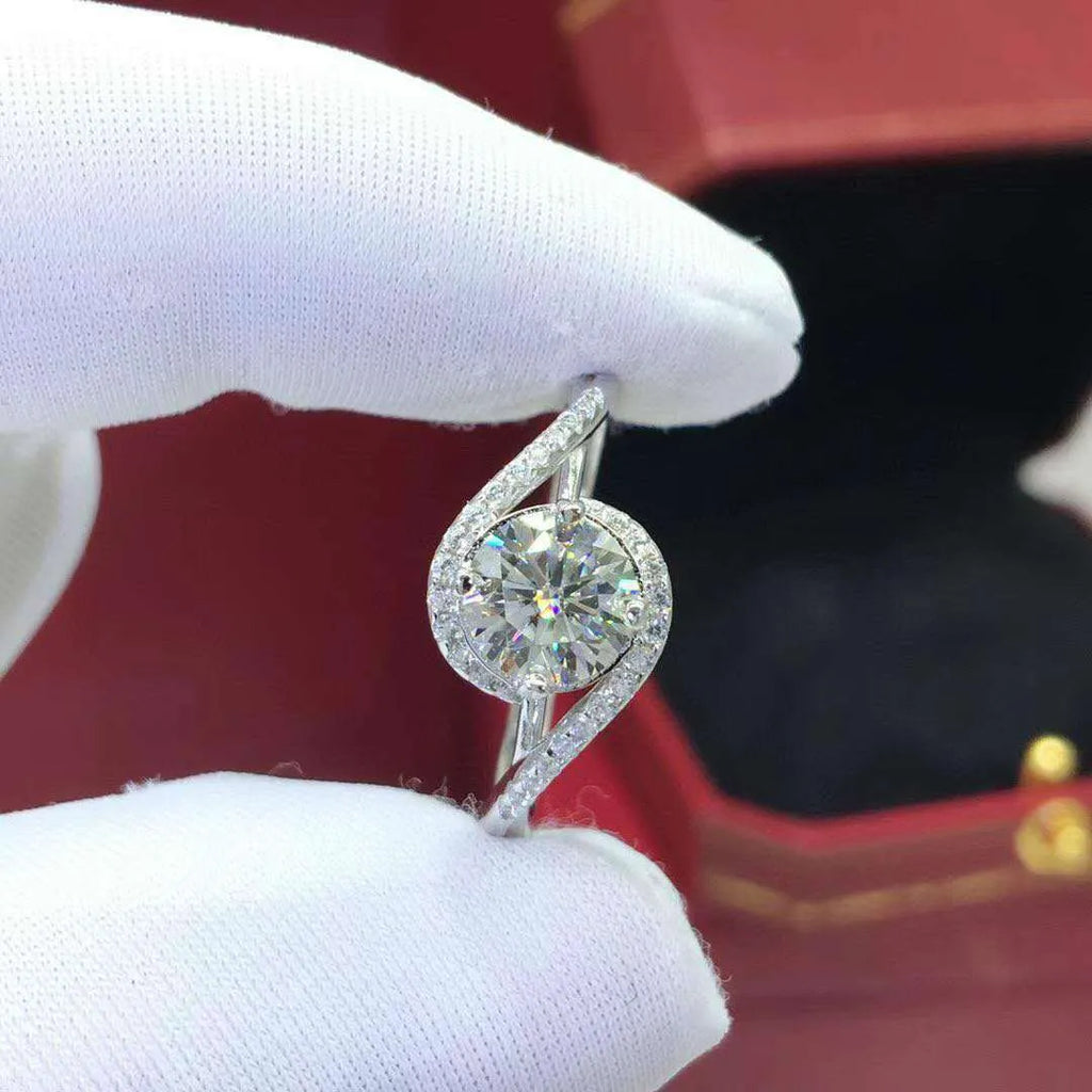 Silver geometric synthetic moissanite ring with adjustable opening showing 8mm stone
