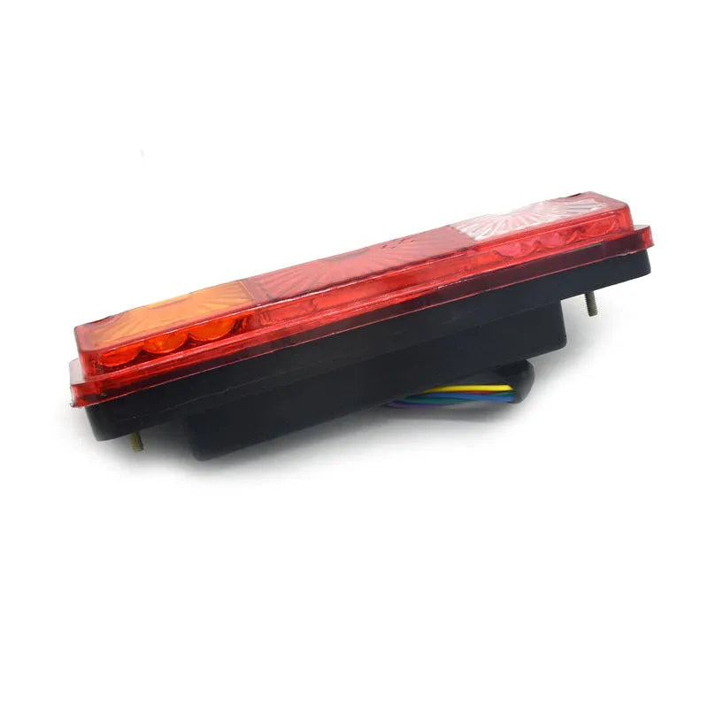 Black integrated shell taillight for electric tricycles, shows 200x70mm dimensions.