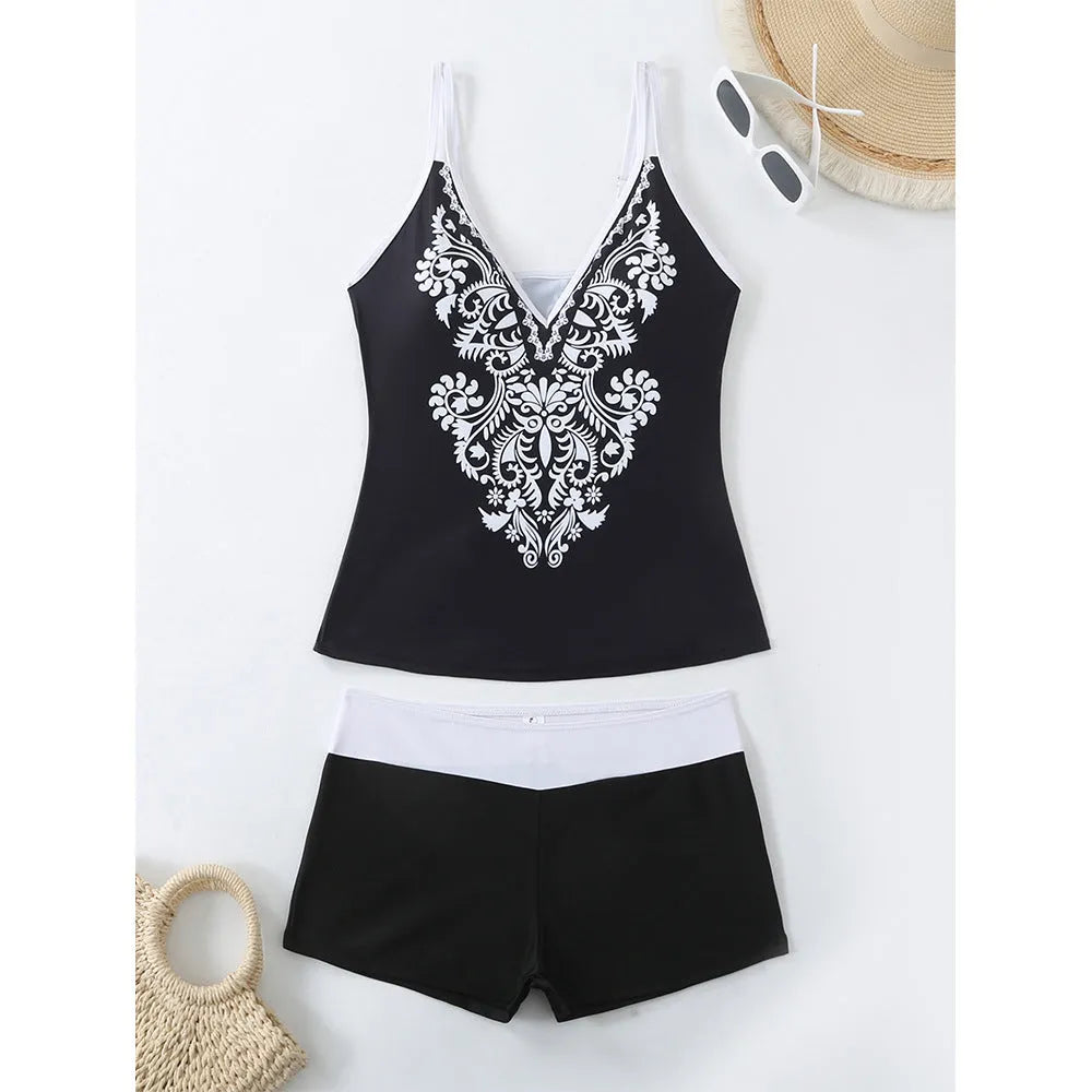 Women's plus size two-piece swimsuit in black or rose red, with briefs bottom.