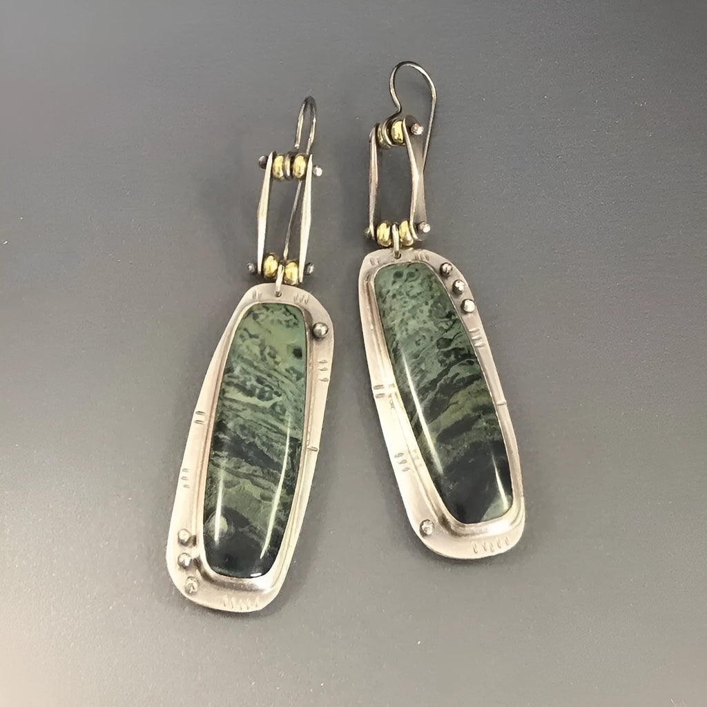 Geometric two-tone marble pattern alloy drop earrings on a white background