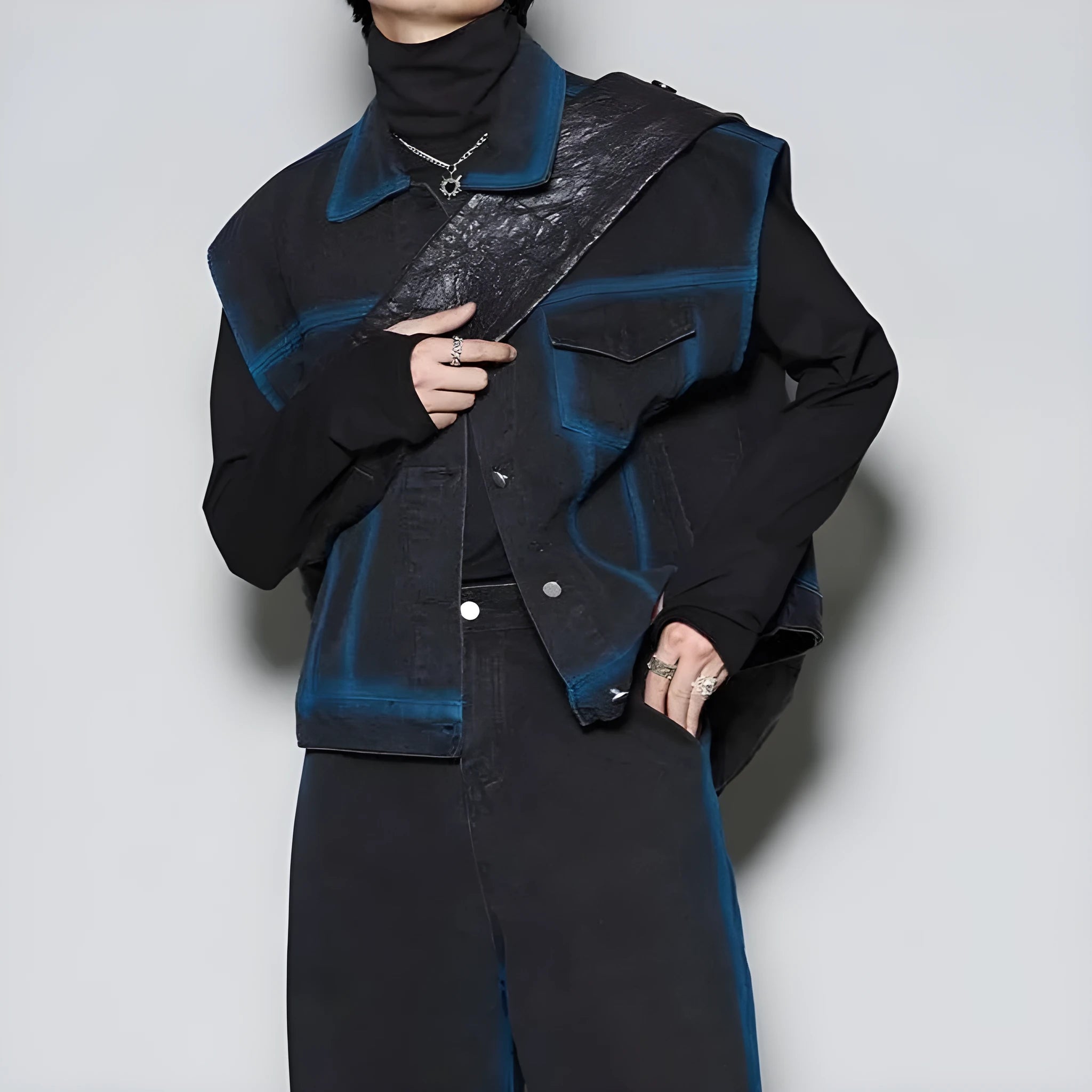Blue distressed fleece-lined vest and matching jeans suit for men on a hanger.