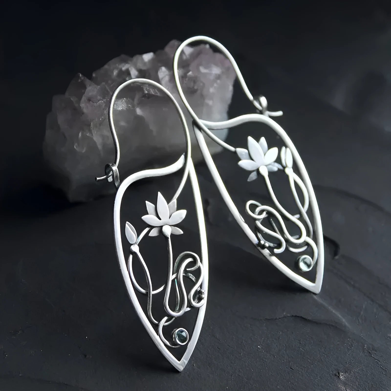 Silver lotus vine and geometric flower design earrings with rhinestone decoration on alloy base