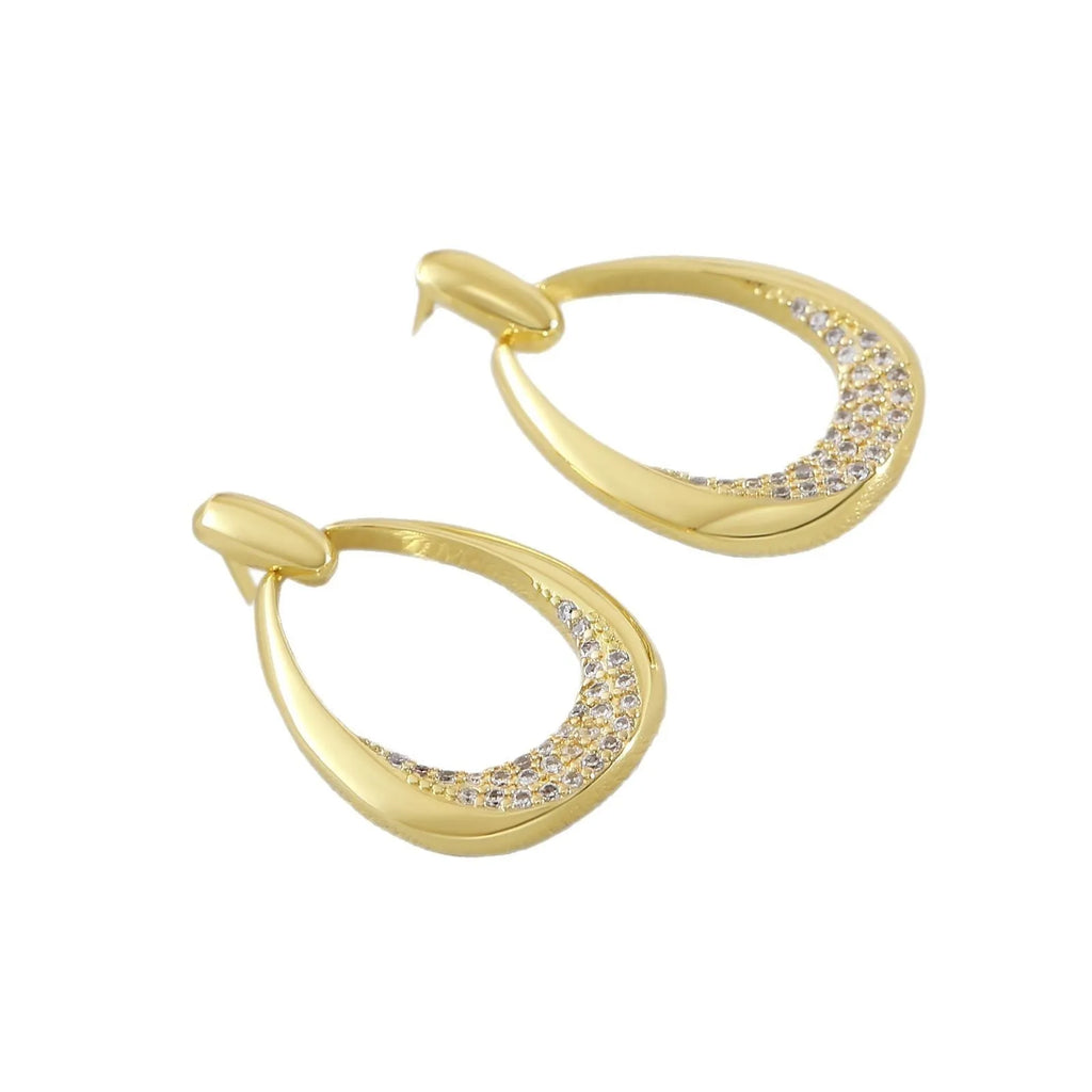 Yellow gold geometric drop-shaped women's earrings with round and oval design elements.