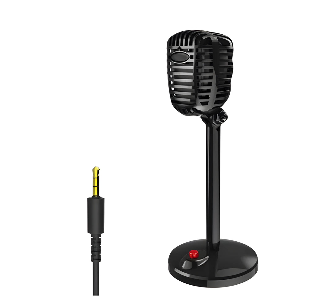 Black USB computer microphone with adjustable stand on desktop for recording and podcasting